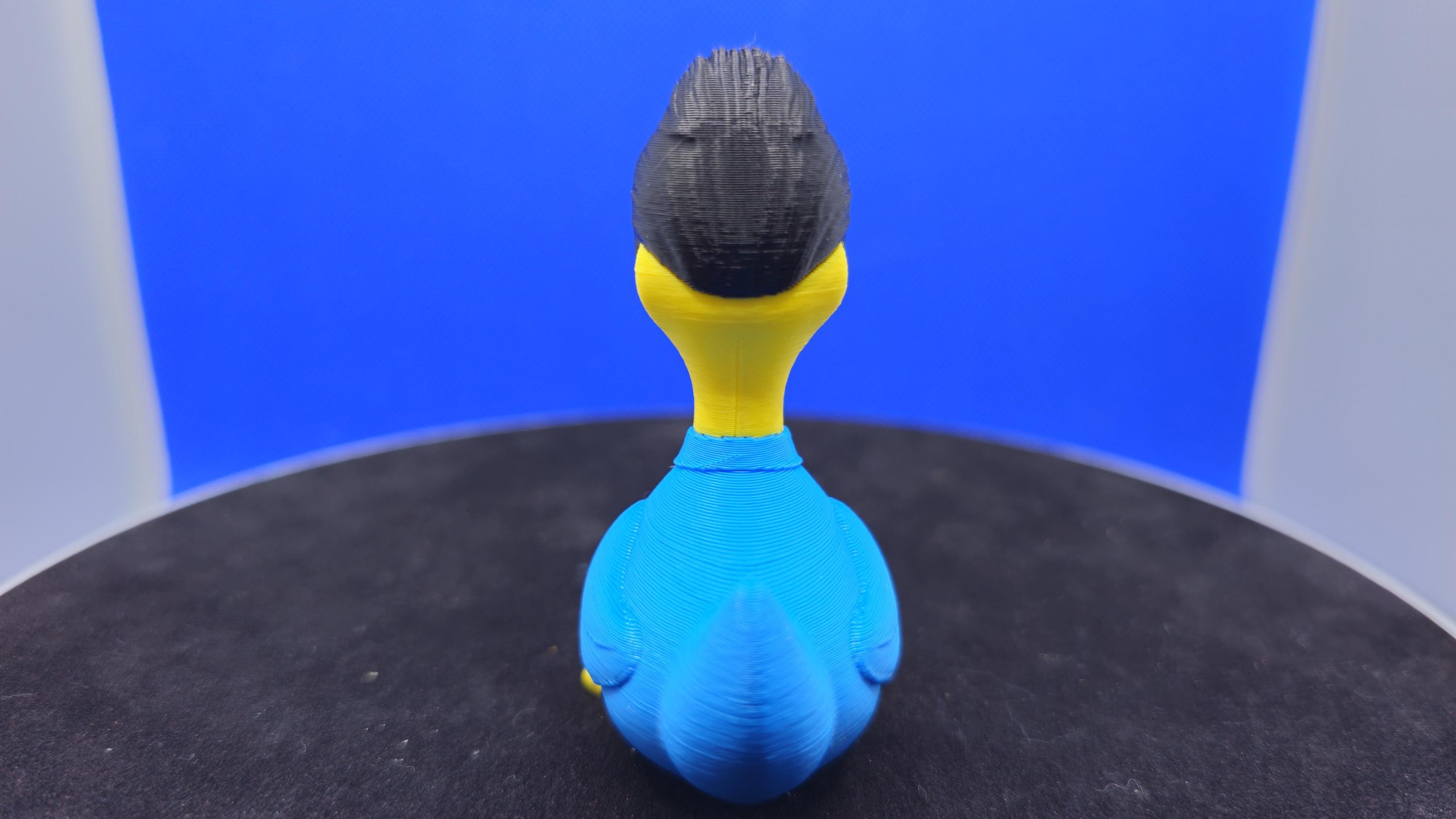 Mr. Stretchy Duck — Elastic Blue Hero Duck Figurine
