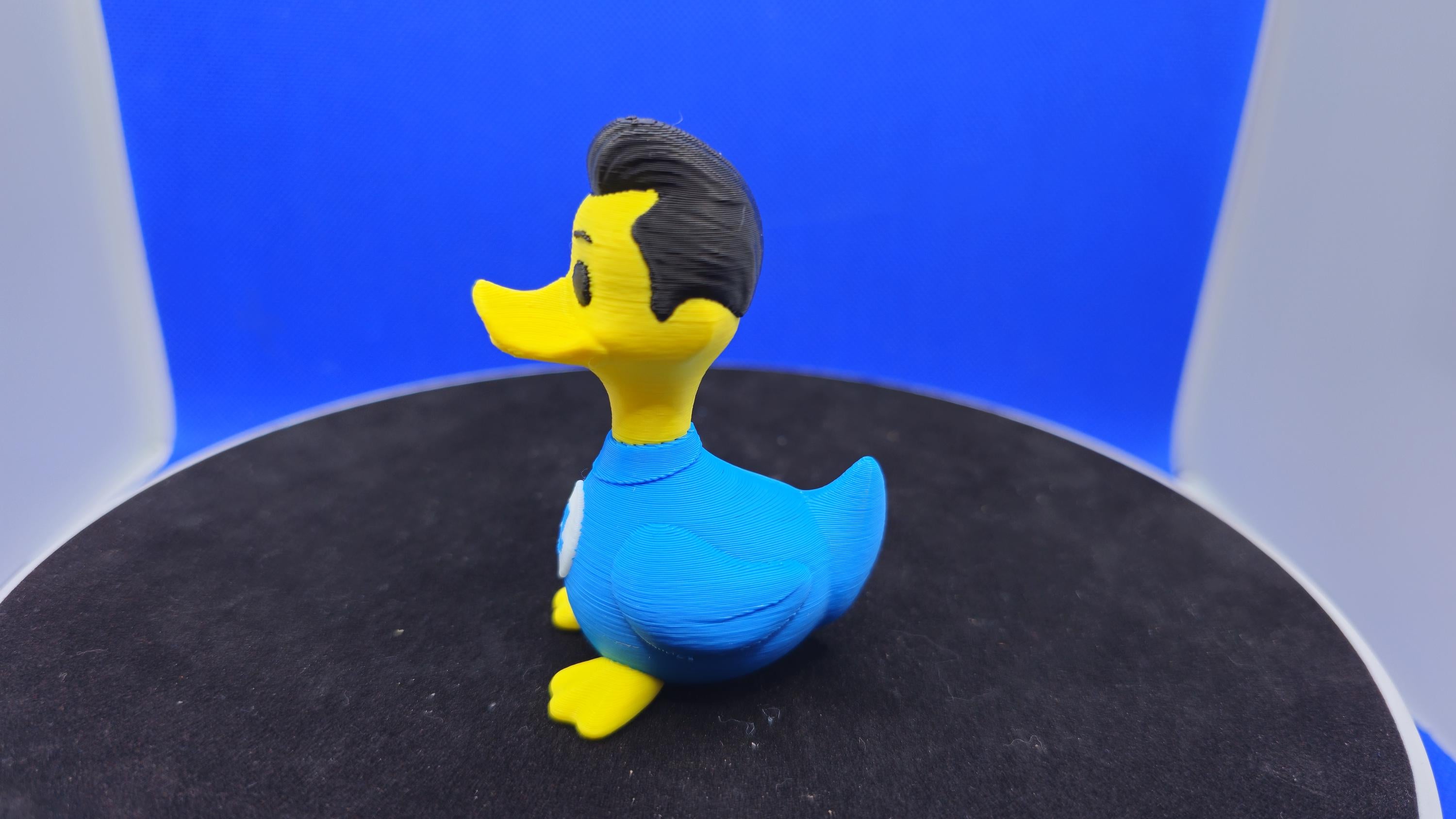 Mr. Stretchy Duck — Elastic Blue Hero Duck Figurine
