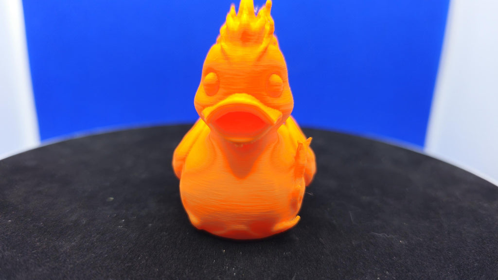 Human Torch Duck — Fiery Orange Hero Duck Figurine