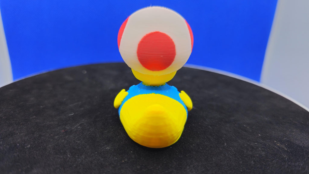 Toadstool Duck Figurine – Mario-Inspired Mushroom Cap Collectible Toy
