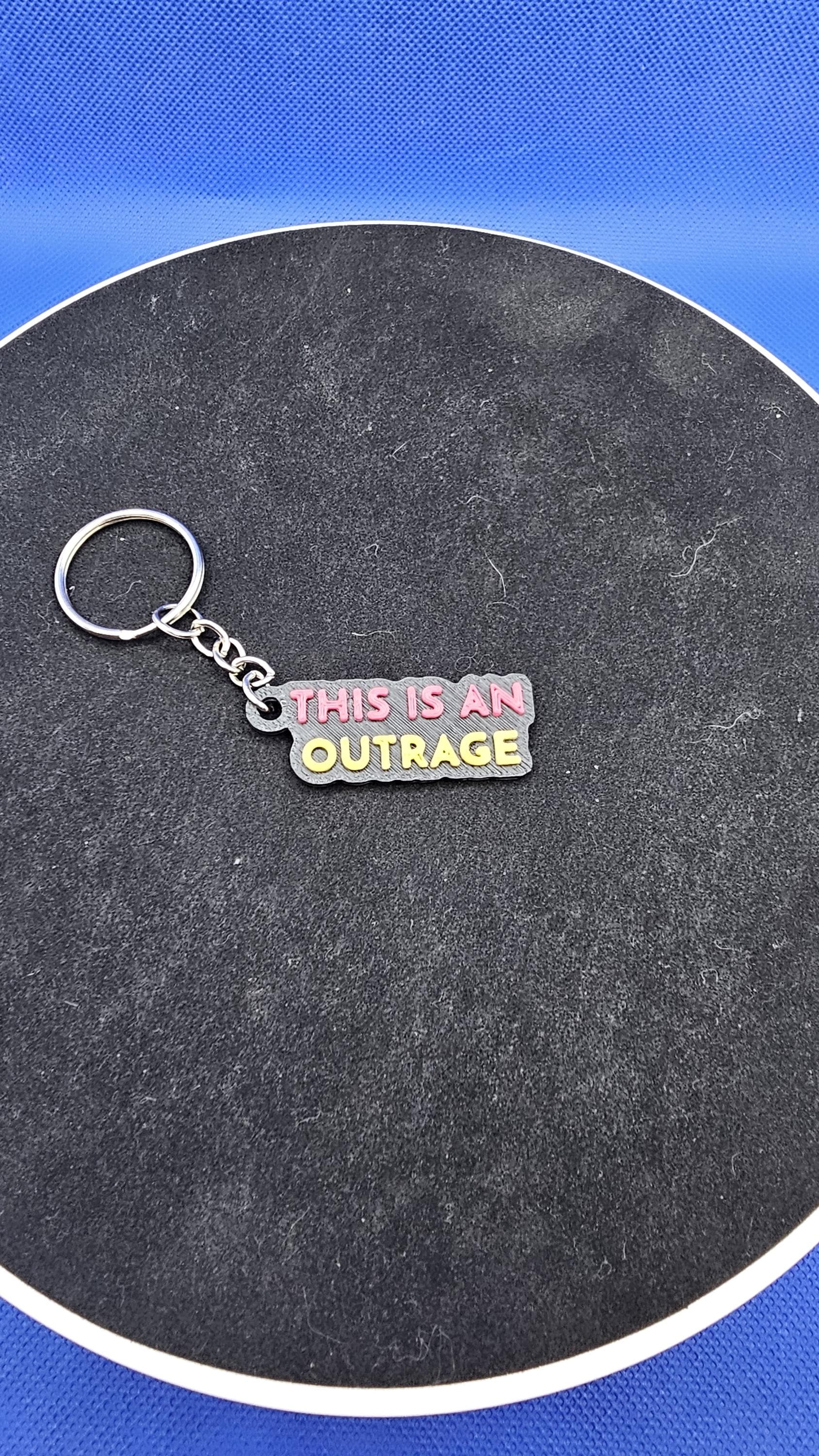 Dungeon Crawler Carl Quote Keychain – “This is an Outrage” – Keychain – Fantasy Book Gift