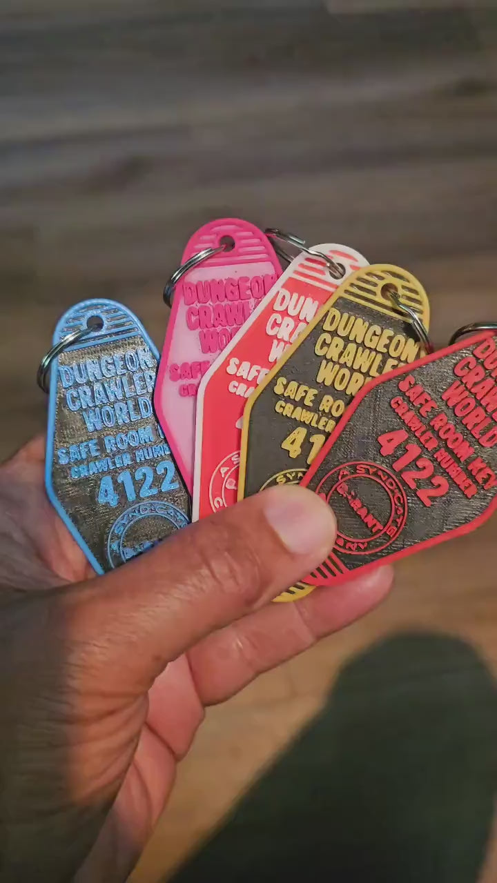Dungeon Crawler World Safe Room Keychain Set – All 6 Color Combos